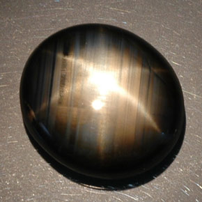 Zaffiro stellato naturale nero da 16,89 ct, taglio ovale, opaco
