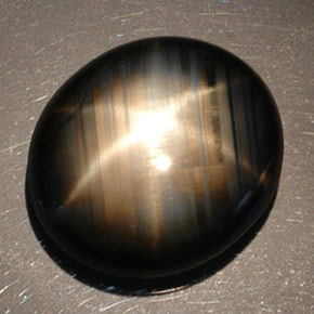 Zaffiro stellato naturale nero da 16,89 ct, taglio ovale, opaco