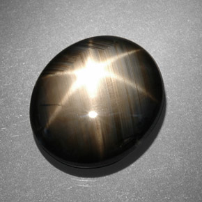 Zaffiro stellato naturale nero da 13,06 ct, taglio ovale, opaco