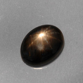 Zaffiro stellato naturale nero da 1,59 ct, taglio ovale, traslucido