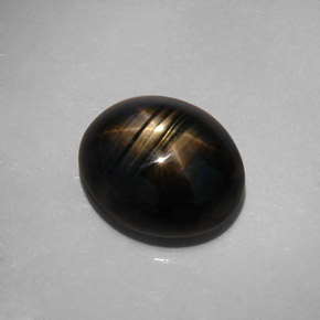 Zaffiro stellato naturale nero da 10,73 ct, taglio ovale, opaco