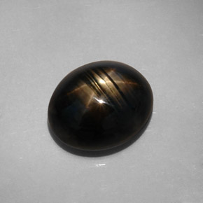 Zaffiro stellato naturale nero da 10,73 ct, taglio ovale, opaco