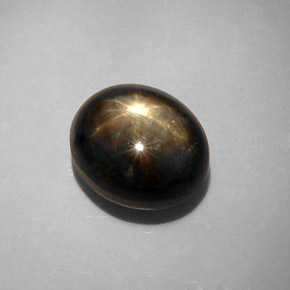 Zaffiro stellato naturale nero da 12,34 ct, taglio ovale, opaco