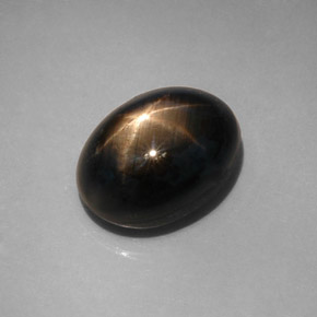 Zaffiro stellato naturale nero da 12,08 ct, taglio ovale, opaco