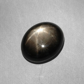 Zaffiro stellato naturale nero da 7,90 ct, taglio ovale, opaco