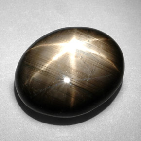 Zaffiro stellato naturale nero da 10,83 ct, taglio ovale, opaco