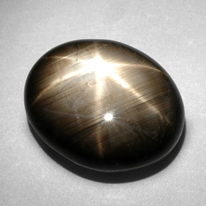 Zaffiro stellato naturale nero da 10,83 ct, taglio ovale, opaco