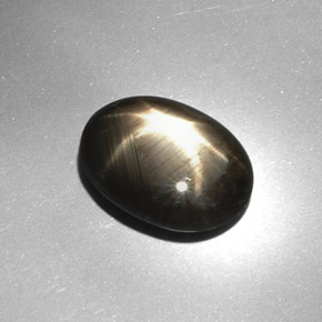 Zaffiro stellato naturale nero da 7,08 ct, taglio ovale, opaco