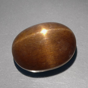 Pietra del sole stellata naturale marrone da 23,68 ct, taglio ovale, opaco