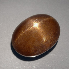 Pietra del sole stellata naturale marrone da 23,68 ct, taglio ovale, opaco
