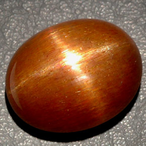 Pietra del sole stellata naturale marrone da 27,65 ct, taglio ovale, opaco
