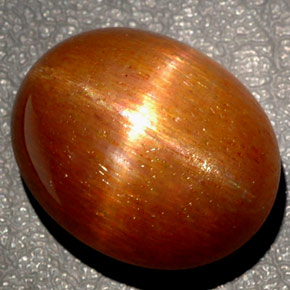 Pietra del sole stellata naturale marrone da 27,65 ct, taglio ovale, opaco