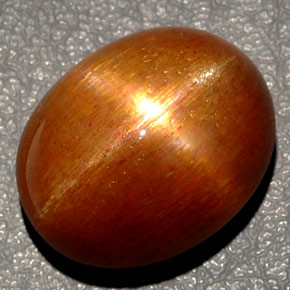 Pietra del sole stellata naturale marrone da 27,65 ct, taglio ovale, opaco
