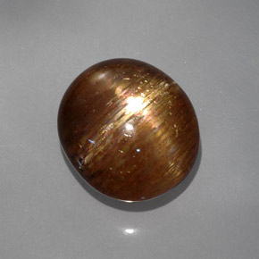 Pietra del sole stellata marrone dorato naturale da 19,22 ct, taglio ovale, opaco
