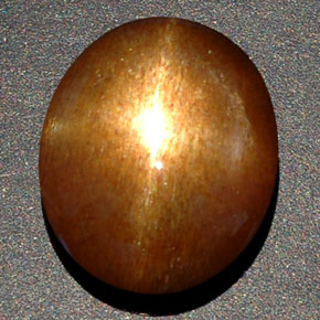 Pietra del sole stellata naturale marrone da 8,09 ct, taglio ovale, opaco