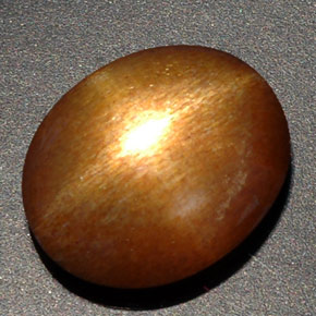 Pietra del sole stellata naturale marrone da 8,09 ct, taglio ovale, opaco