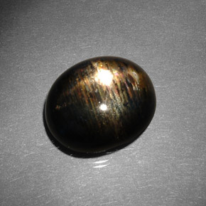 Pietra del sole stellata naturale marrone da 10,22 ct, taglio ovale, opaco