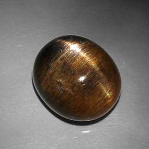 Pietra del sole stellata naturale marrone da 12,68 ct, taglio ovale, opaco