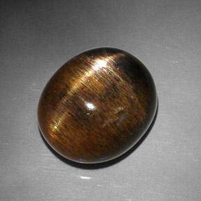 Pietra del sole stellata naturale marrone da 12,68 ct, taglio ovale, opaco