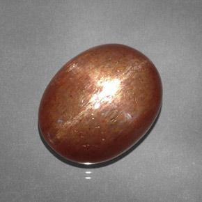 Pietra del sole stellata naturale marrone da 15,61 ct, taglio ovale, opaco