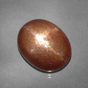 Pietra del sole stellata naturale marrone da 15,61 ct, taglio ovale, opaco