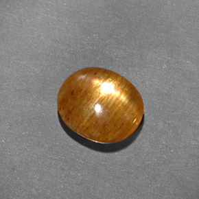 Pietra solare stellare Marrone dorato naturale da 1.41 ct, Taglio ovale, Opaco
