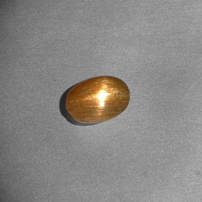 Pietra solare stellare Marrone dorato naturale da 0.37 ct, Taglio ovale, Opaco