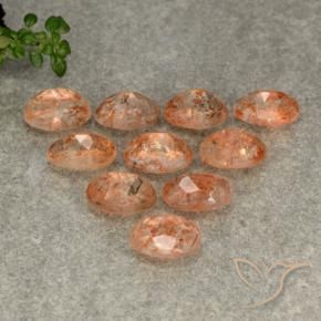 Gemme di Pietra solare Arancione rossastra naturale da 5.13 ct, Ovale, Traslucido