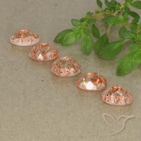 Gemme di Pietra solare Arancio medio-chiaro naturale da 4.18 ct, Ovale, Traslucido