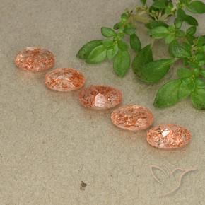 Gemme di Pietra solare Arancio medio-chiaro naturale da 3.24 ct, Ovale, Traslucido