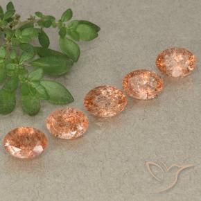 Gemme di Pietra solare Arancio Medio naturale da 3.94 ct, Ovale, Traslucido