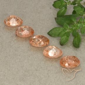 Gemme di Pietra solare Arancio Medio naturale da 3.94 ct, Ovale, Traslucido