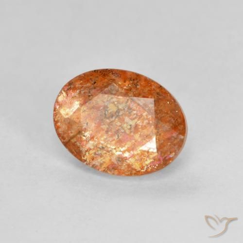 Pietra solare Arancione rossastra naturale da 1.31 ct, Ovale, Traslucido