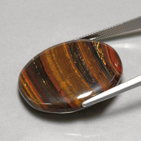 Tiger's eye matrix naturale multicolore da 53,09 ct, taglio ovale, opaco