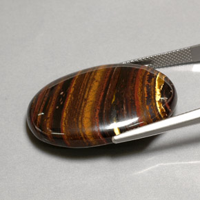 Tiger's eye matrix naturale multicolore da 43,53 ct, taglio ovale, opaco