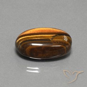 Occhio di tigre Marrone dorato naturale da 27.02 ct, Ovale, Opaco