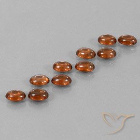 Gemme di Zircone Arancione scuro naturale da 7.72 ct, Ovale, Trasparente