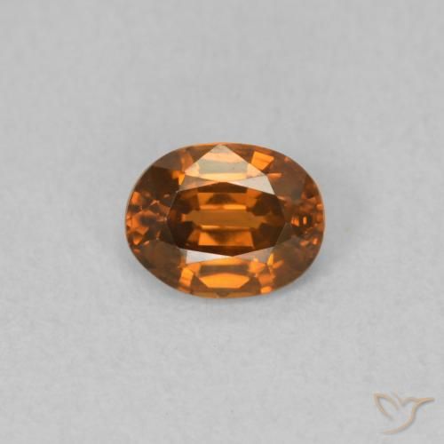 Zircone Arancione scuro naturale da 0.59 ct, Ovale, VVS-VS