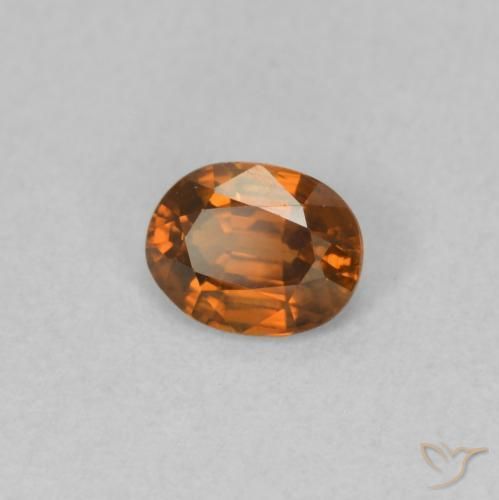 Zircone Arancione scuro naturale da 0.59 ct, Ovale, VVS-VS