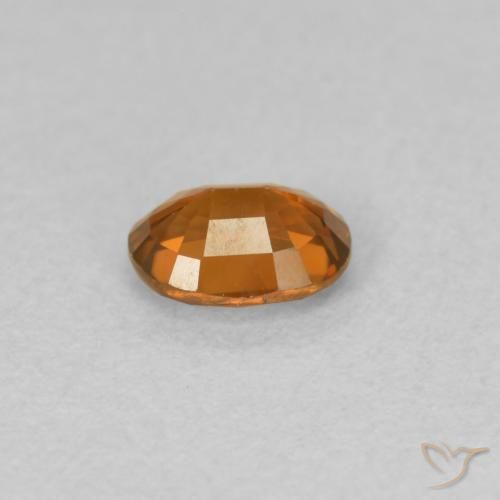 Zircone Arancione scuro naturale da 0.59 ct, Ovale, VVS-VS