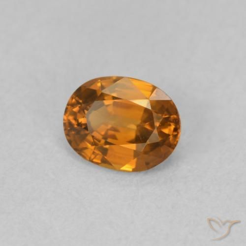 Zircone Arancione scuro naturale da 0.60 ct, Ovale, VVS-VS