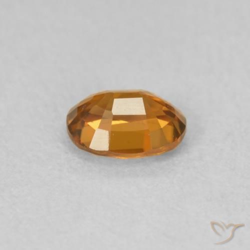 Zircone Arancione scuro naturale da 0.60 ct, Ovale, VVS-VS
