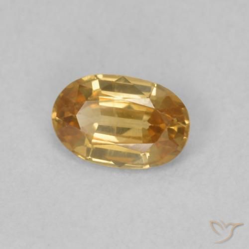 Zircone Arancione-Oro naturale da 0.63 ct, Ovale, VVS-VS