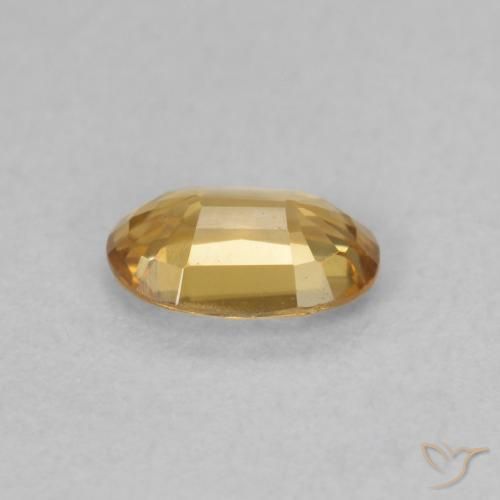 Zircone Arancione-Oro naturale da 0.63 ct, Ovale, VVS-VS