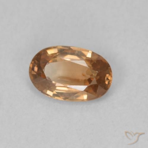 Zircone Arancione-Oro naturale da 0.64 ct, Ovale, VVS-VS