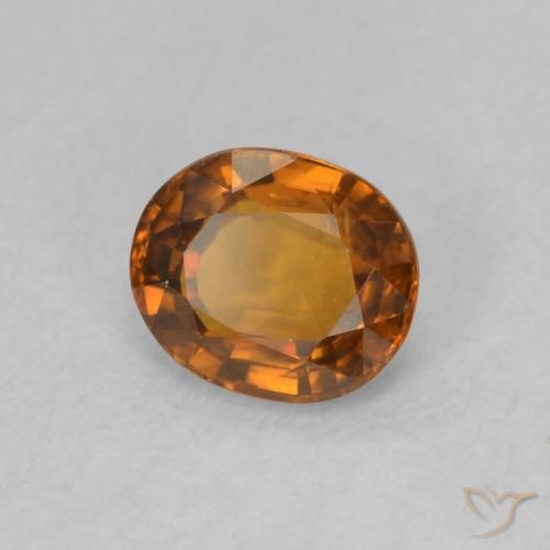 Zircone Arancione scuro naturale da 0.88 ct, Ovale, VVS-VS