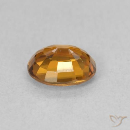 Zircone Arancione scuro naturale da 0.88 ct, Ovale, VVS-VS