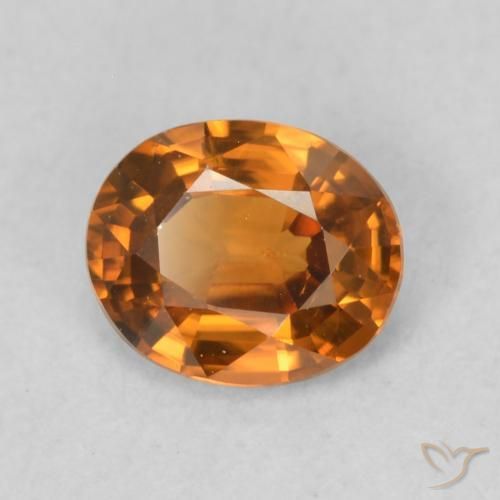 Zircone Medium Dark-Orange naturale da 0.84 ct, Ovale, VVS-VS