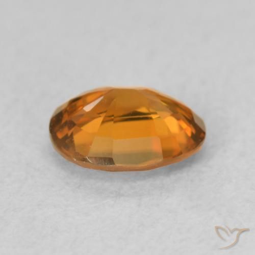 Zircone Medium Dark-Orange naturale da 0.84 ct, Ovale, VVS-VS