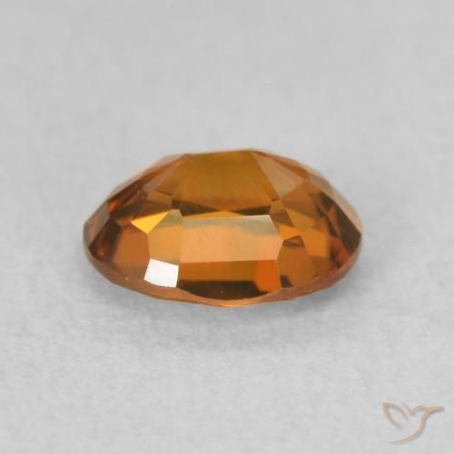 Zircone Medium Dark-Orange naturale da 0.93 ct, Ovale, VVS-VS